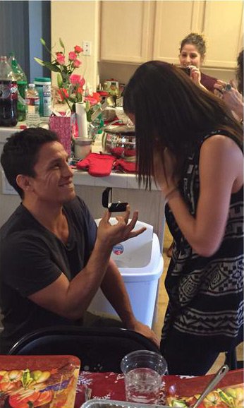 This is the first time we've ever seen somebody propose while standing up.