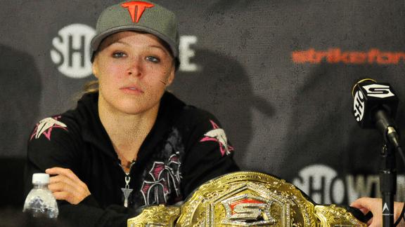 Rousey already has two MMA belts and a bunch of medals from Judo...and she wants MORE.