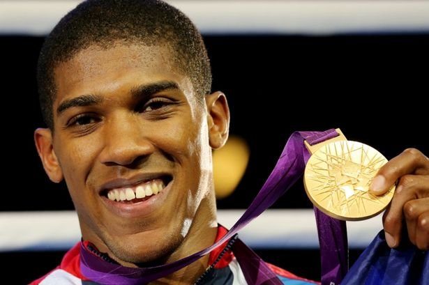 The big man Anthony Joshua with his Gold