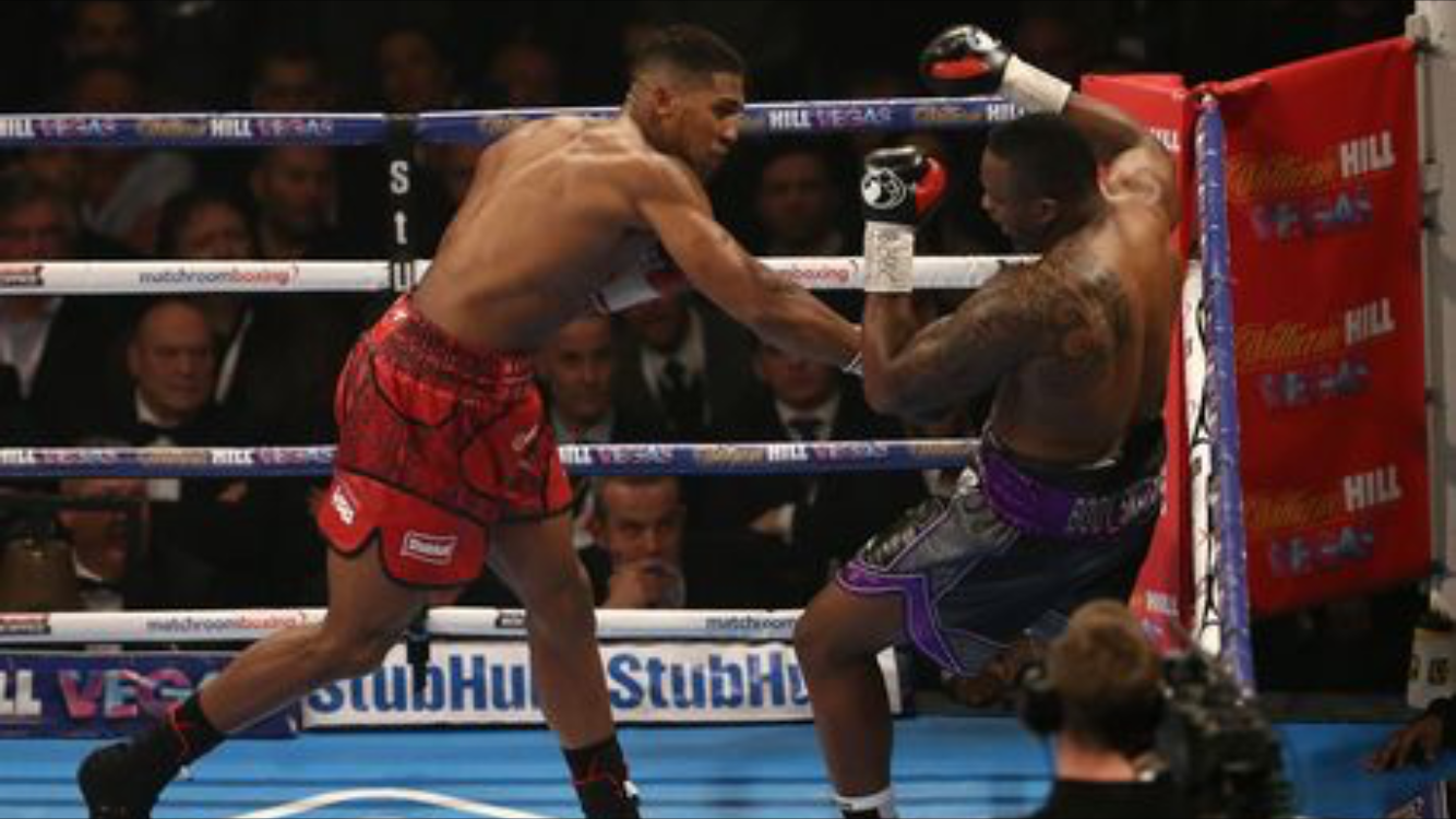 Anthony Joshua defeating Dillian Whyte