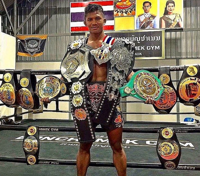 Buakaw Banchamek With his many title belts. 