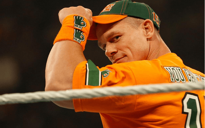 John Cena isn't fat..but he totally is a dweeb who wears bright orange shirts and has a terrible catchphrase. Photo by WWE.com.