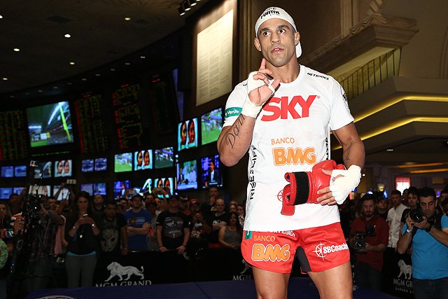 Vitor made lots and lots of money off all those logos on his shirt...and that got taken away by the Reebok deal. Photo by Sherdog.com.