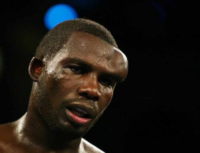 Hasim Rahman give headbutts Evander Holyfield