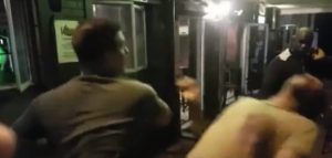 Man get knocked out for talking about racism