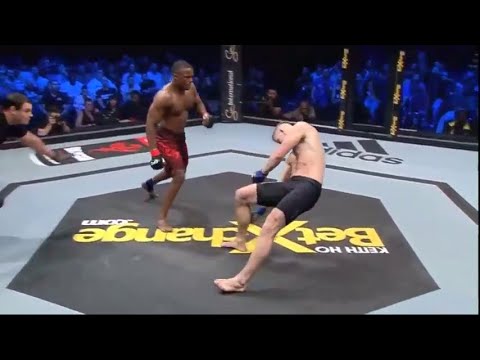 Knocks out opponent with back elbow