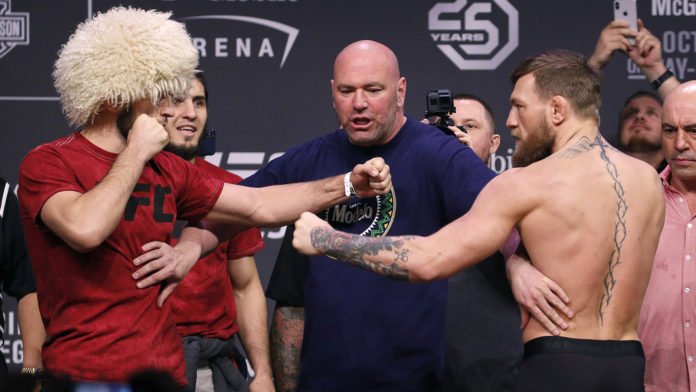 Conor McGregor, right, and Khabib Nurmagomedov during a weigh-in UFC 229 MMA Oct. 5, 2018