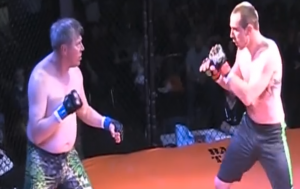 Son and Dad in the cage before their mma fight begins