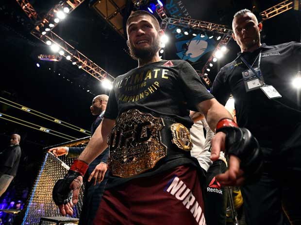 Khabib Nurmagomedov at UFC 229 showing off is new champion belt