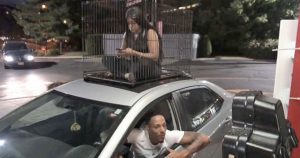 Woman Rides In Cage
